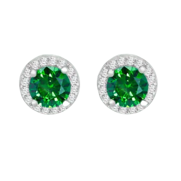 A pair of round stud earrings featuring a vibrant green center stone surrounded by a halo of small clear stones in a silver-toned setting, shown on a light gray gradient background.