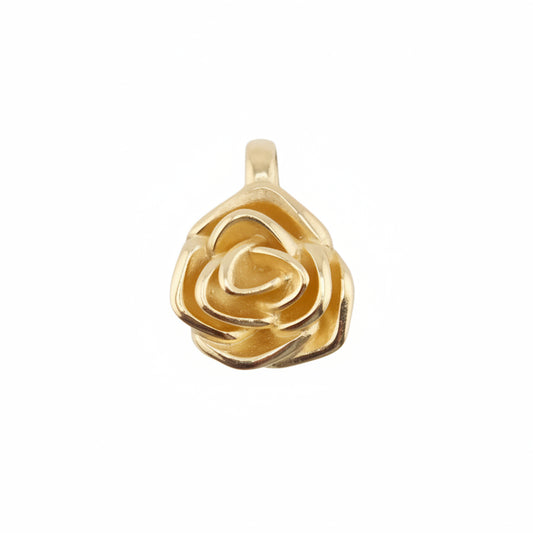 A yellow gold plated rose flower pendant on a white background