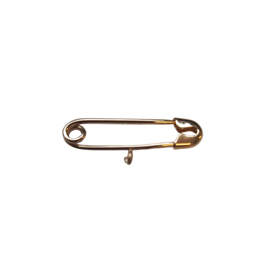 A 9ct gold pram pin, designed in the style of a safety pin, with a width of 25mm.